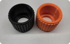 Two replacement collars, one copied from the original