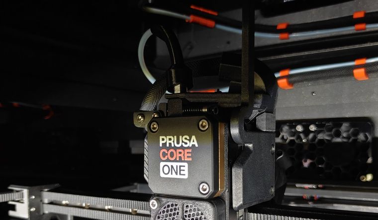 Prusa CORE One printer toolhead in the Guam workshop